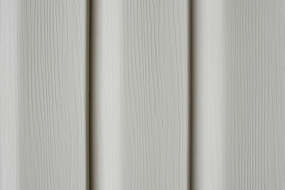 How to replace a section of vinyl siding and removing small pieces