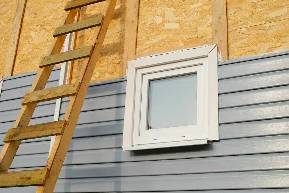 How to install vinyl siding around windows