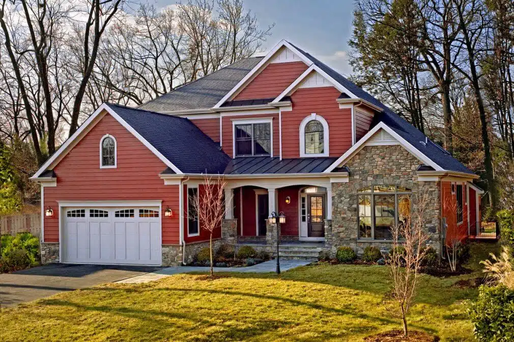 James Hardie lap siding in Countrylane Red colour Siding contractors in Edmonton - working with siding planks, panels, shingles for your home